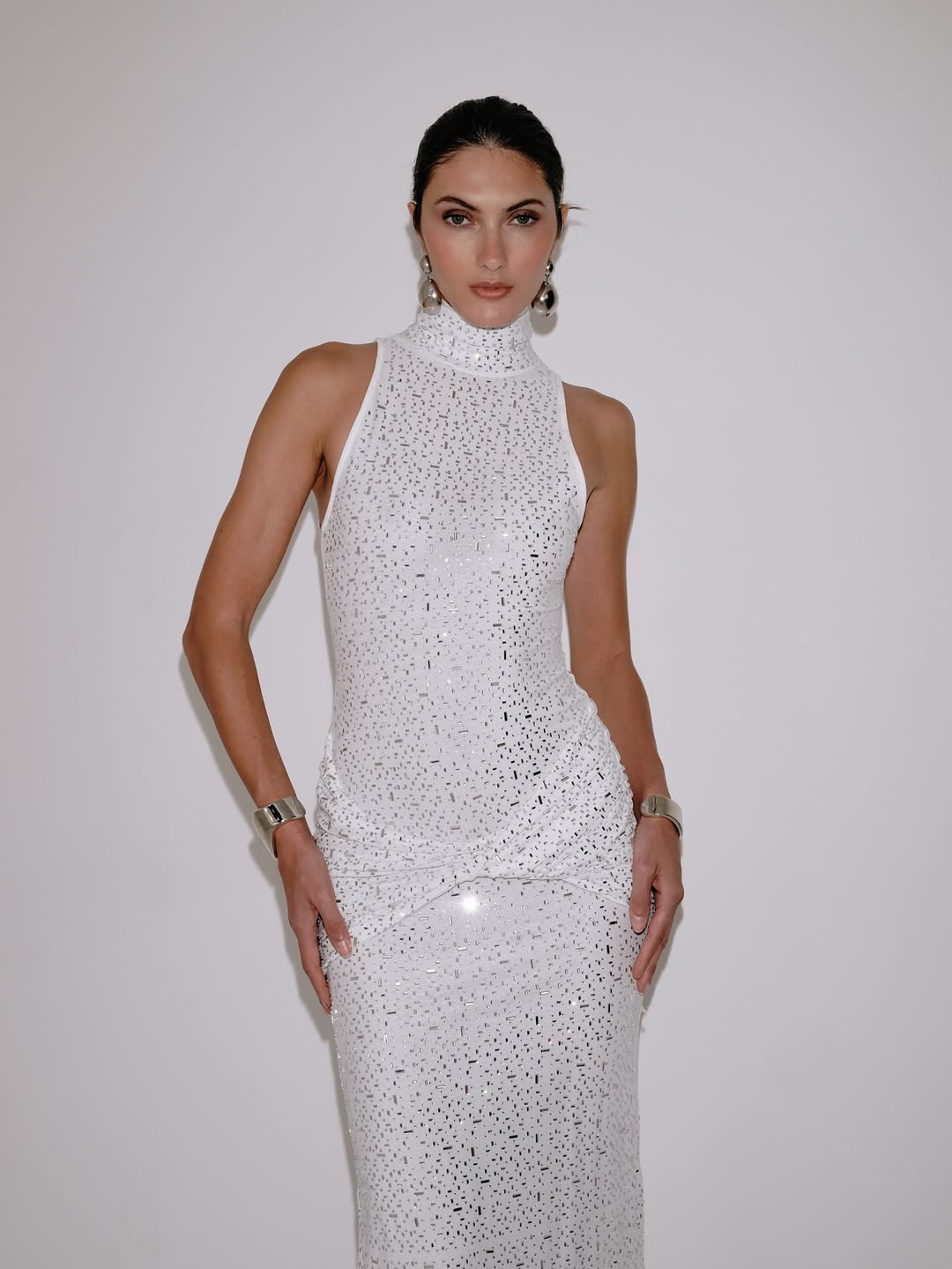 Roya Reverie: Delfi Collective's Halter Maxis Sculpt Holiday Glamour