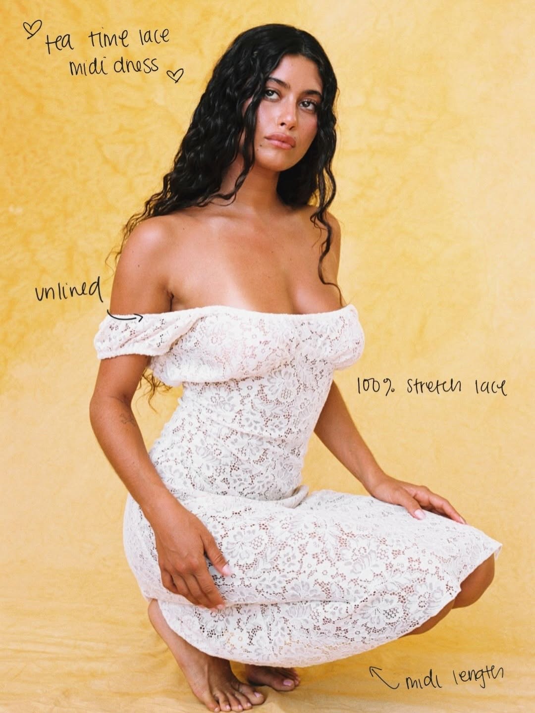 A white, off-the-shoulder midi dress made of 100% stretch lace with a floral pattern. The garment is unlined and has a form-fitting silhouette.